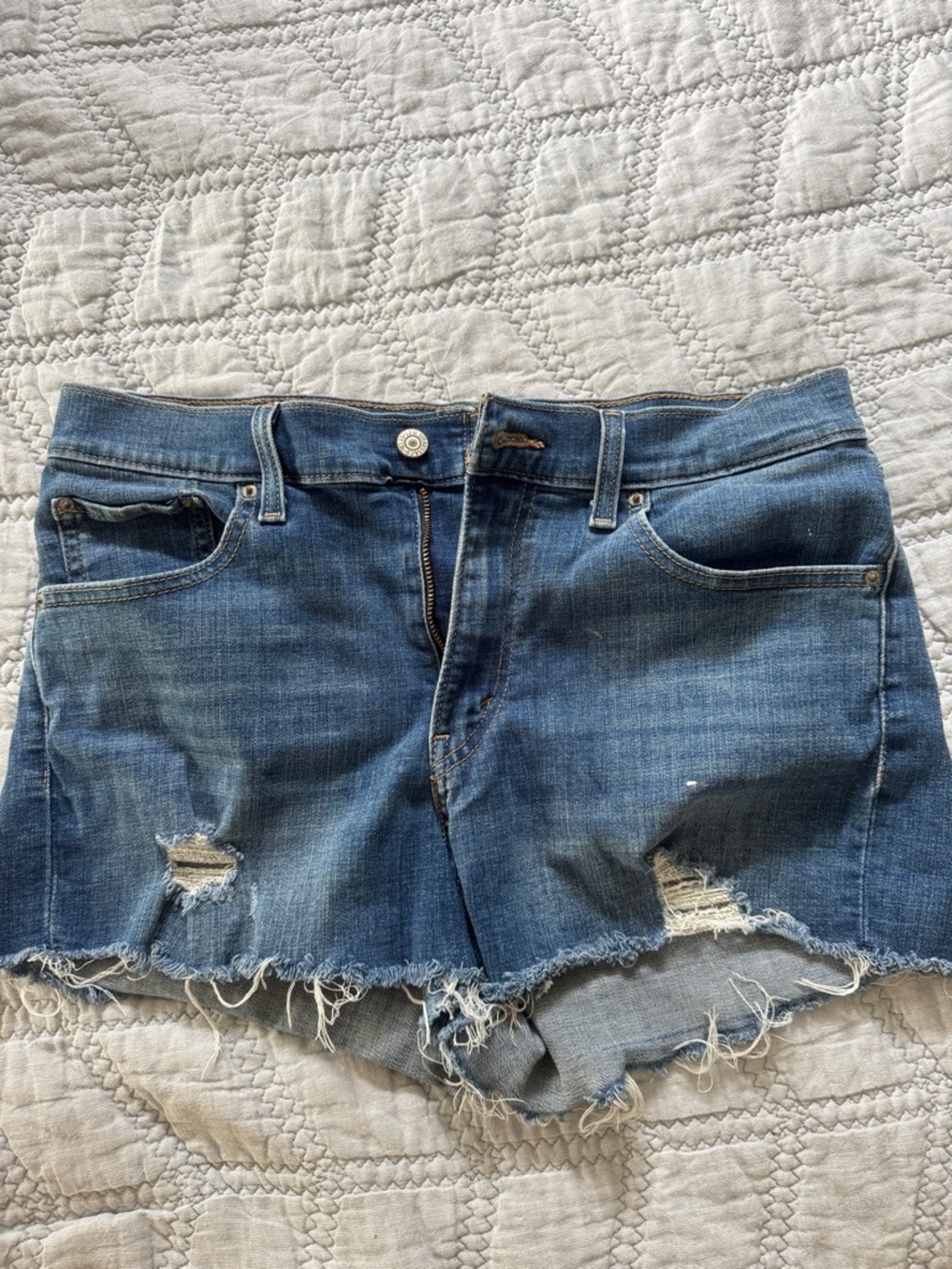 Levi's Medium Blue Distressed Denim Shorts